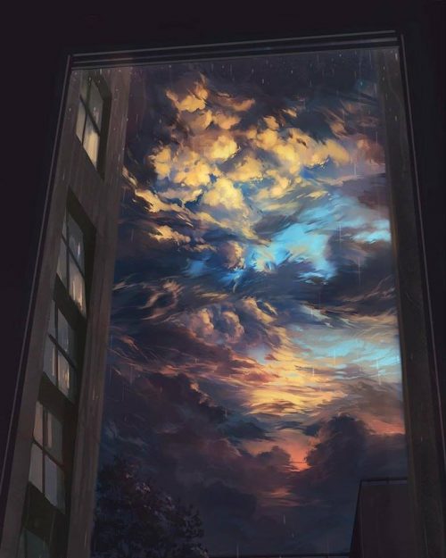 Una ventana abierta donde se ve un cielo parcialmente cubierto con distintos colores
